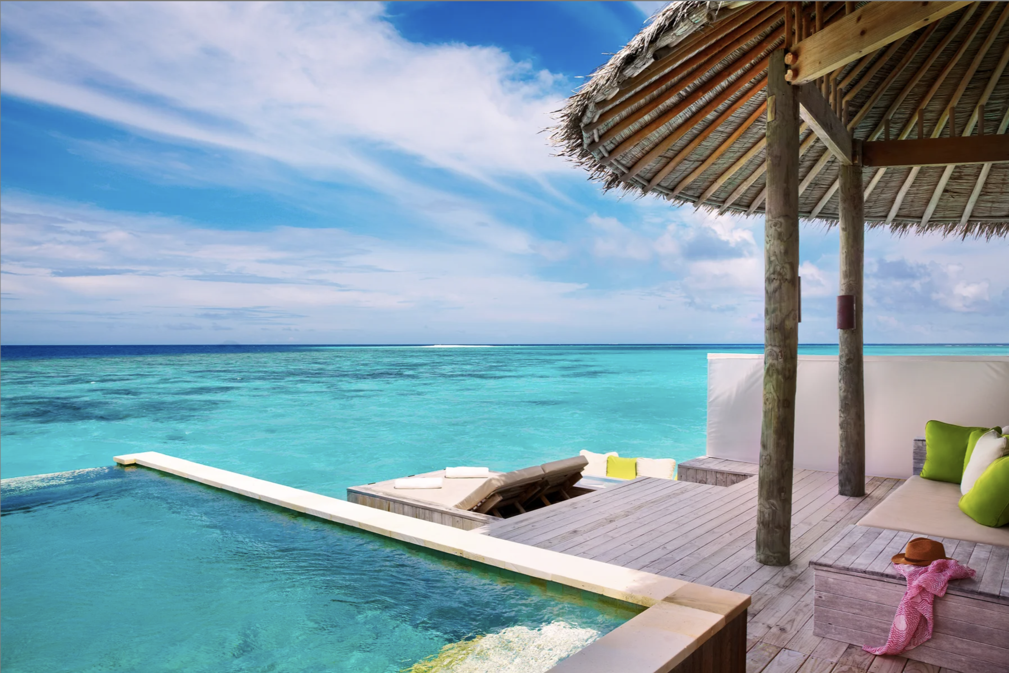 An overwater villa and turquoise ocean in the Maldives